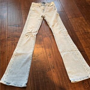 Women's Light Blue Distressed Jeans